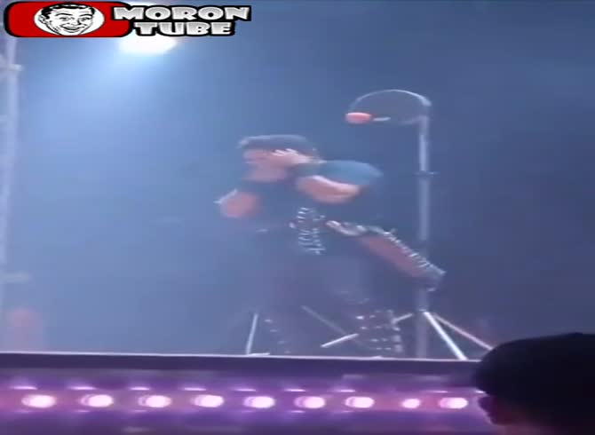 Video :It doesn't go as planned as he tries to aim an apple at this man's skull (Warning - disturbing)